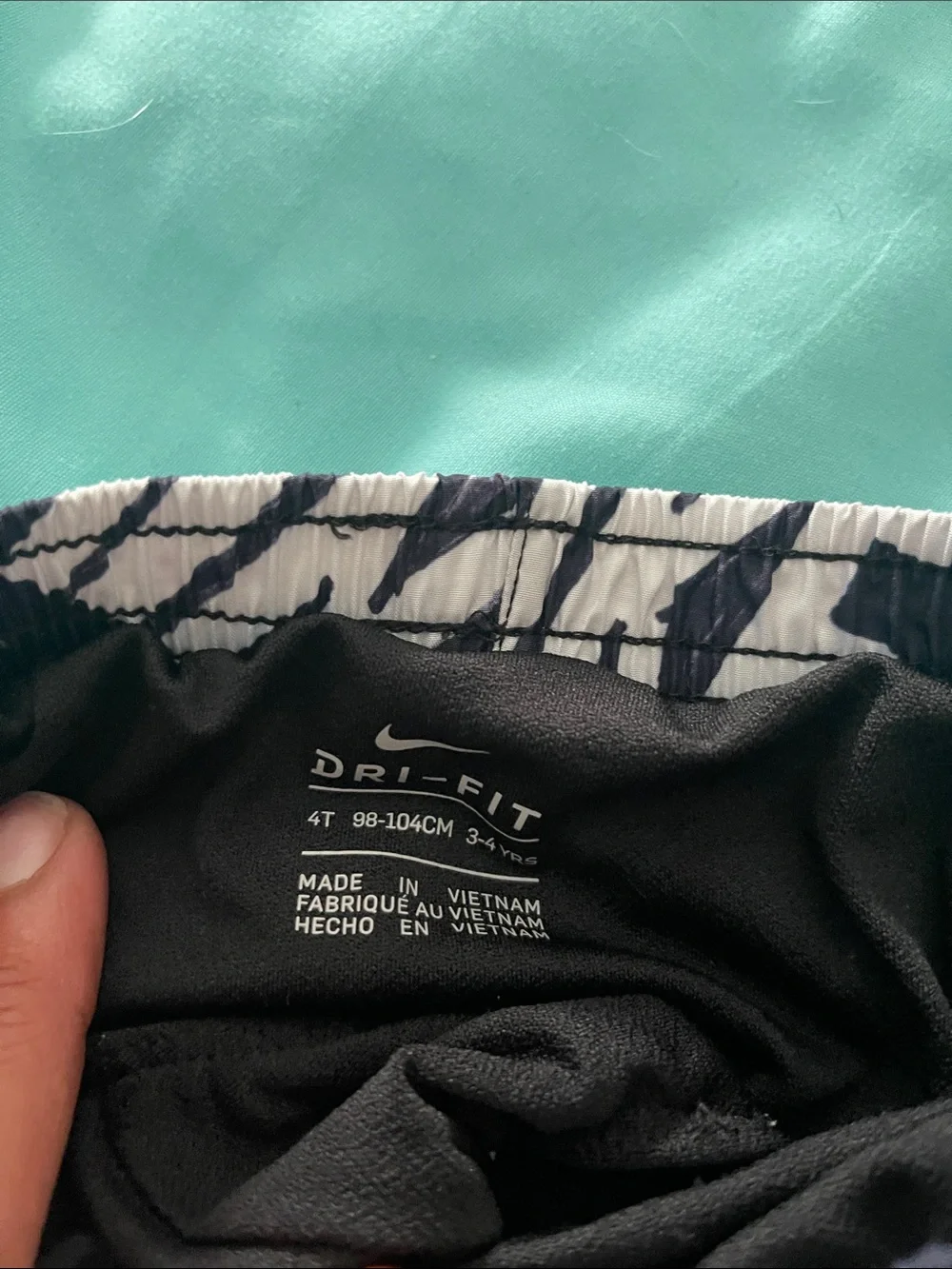 Nike Kids Black & White Graphic Swim Trunks with Pink Logo